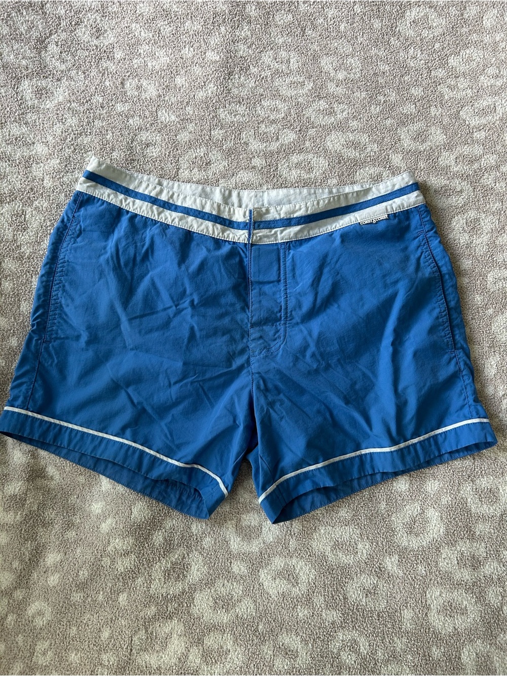 Blue Athletic Shorts with White Trim